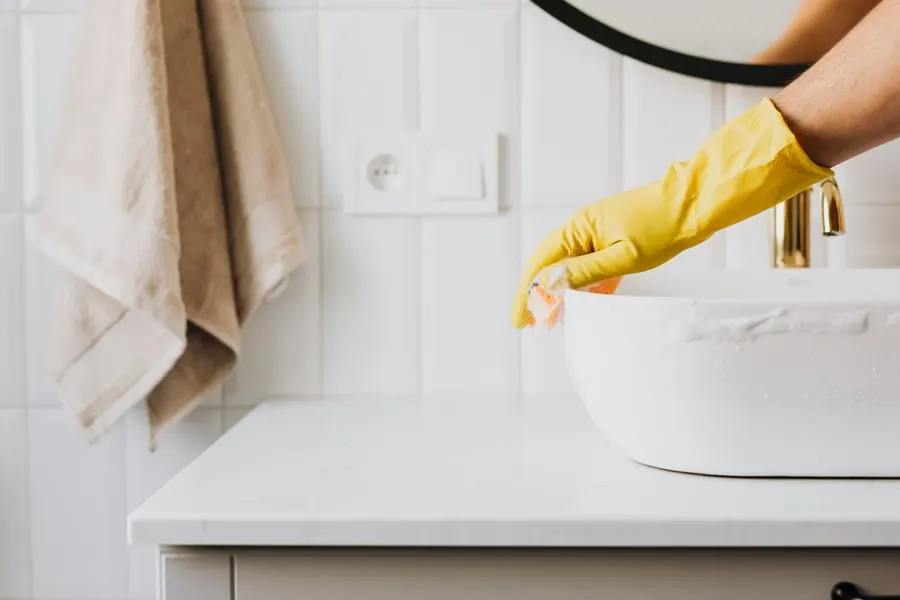 Scrubbing a bathroom sink